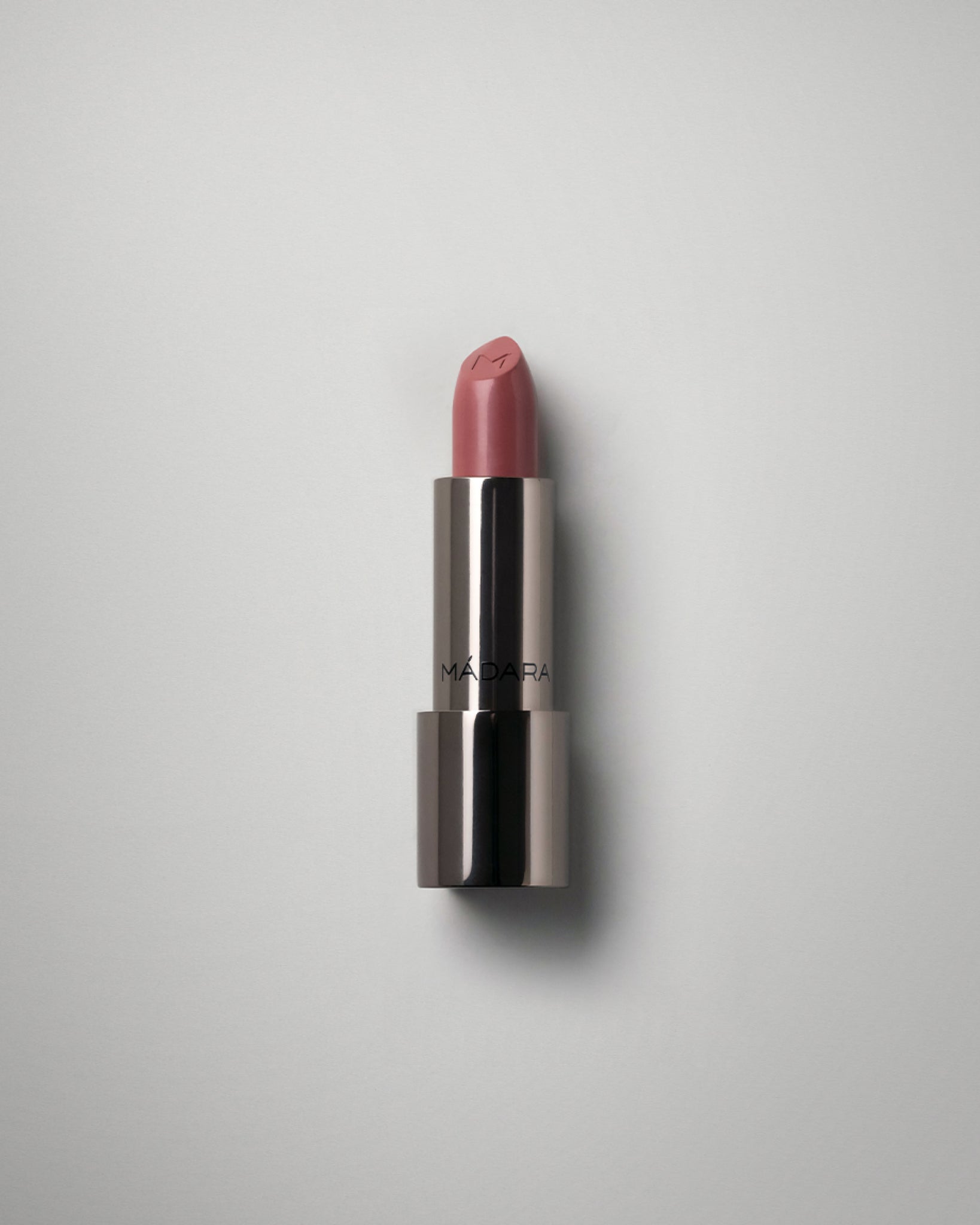 MÁDARA Organic Skincare dazzle nights lipstick flattery A6501 product photo on plain background.