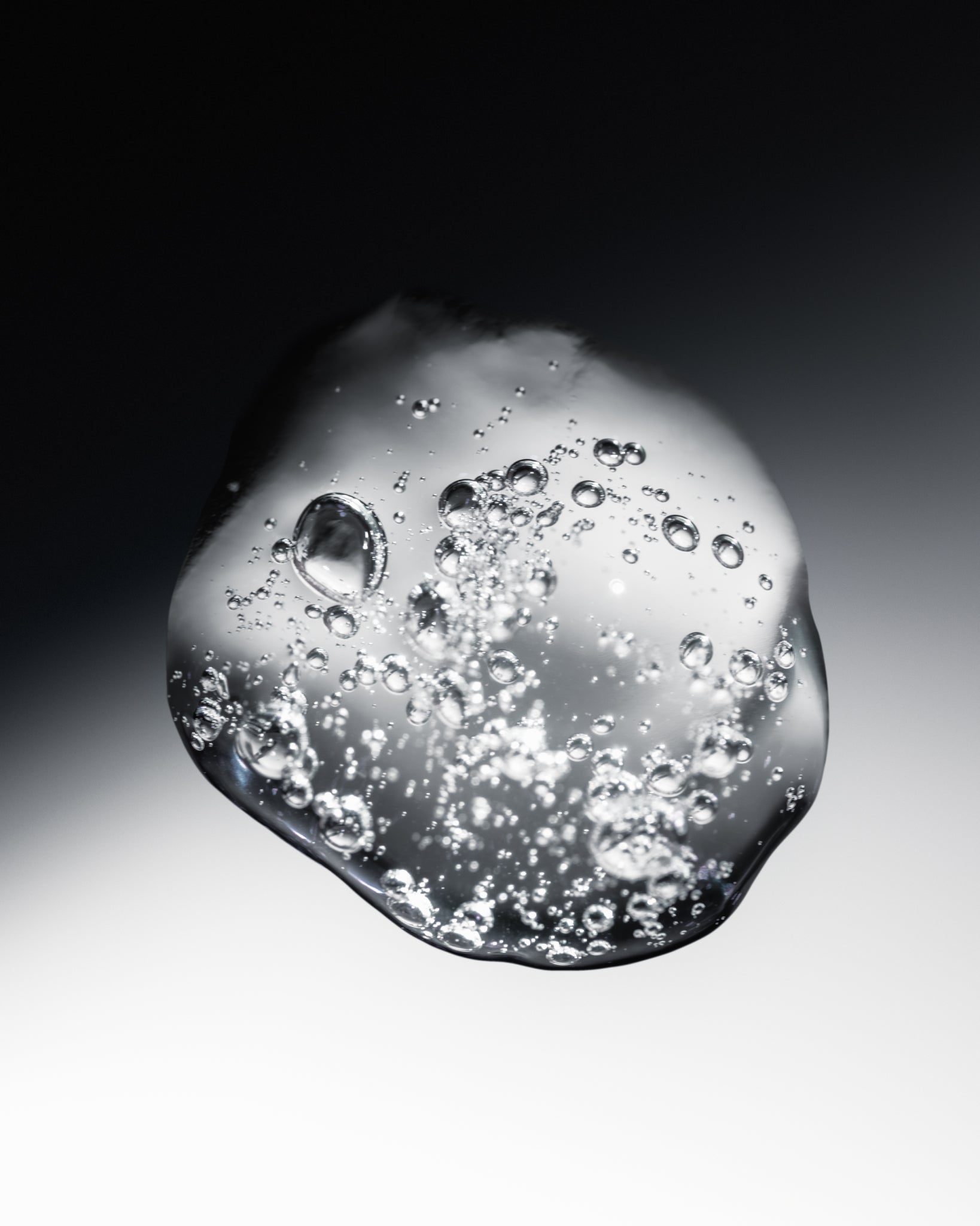 Texture close-up of MÁDARA Organic Skincare hydra firm jelly SM3342 15 gel moisturizer �swatch demonstrates consistency and finish.