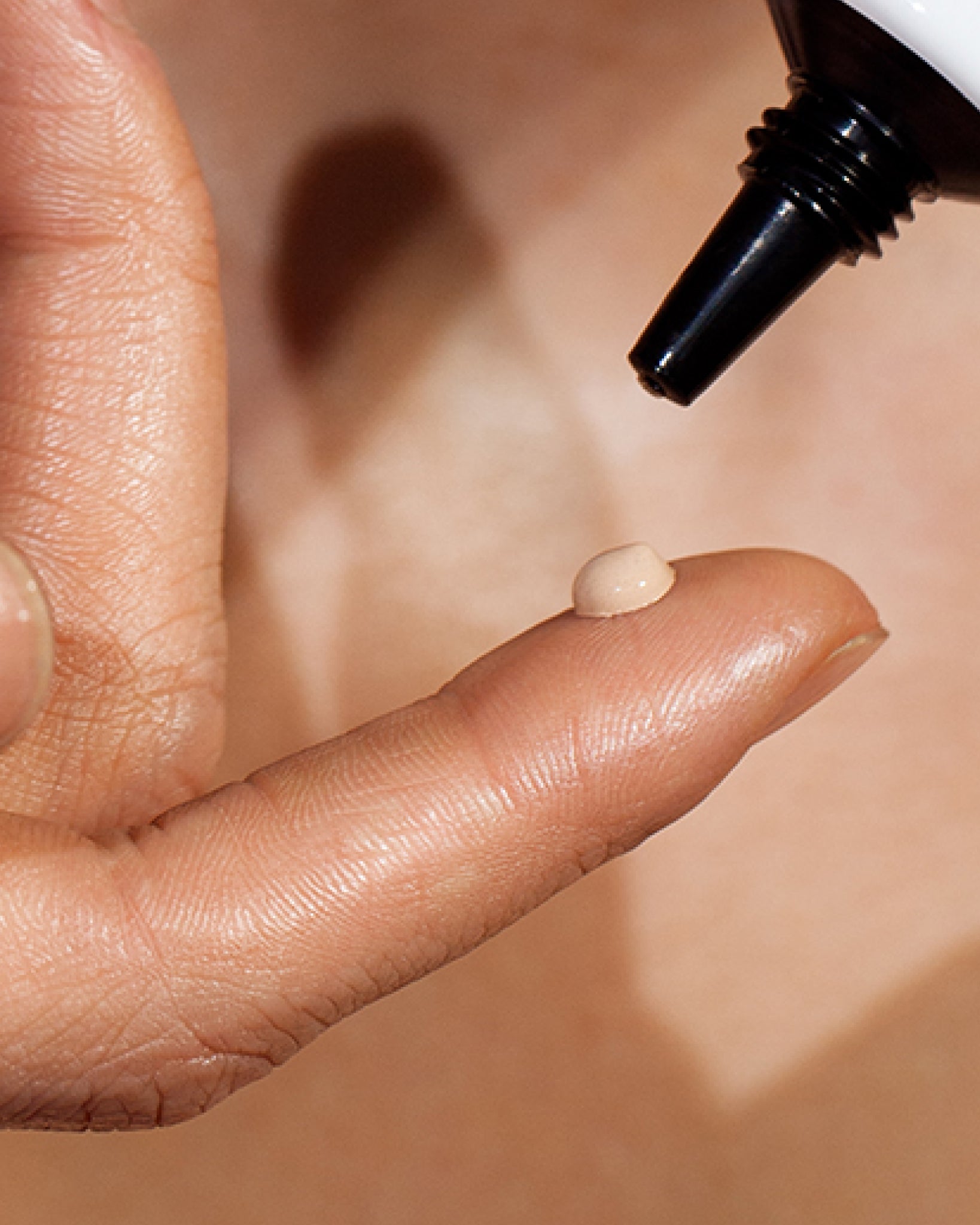 Model wearing MÁDARA Organic Skincare tinted sun protection cream for face SM3415 10 face cream on skin; close-up portrait shows natural application results.