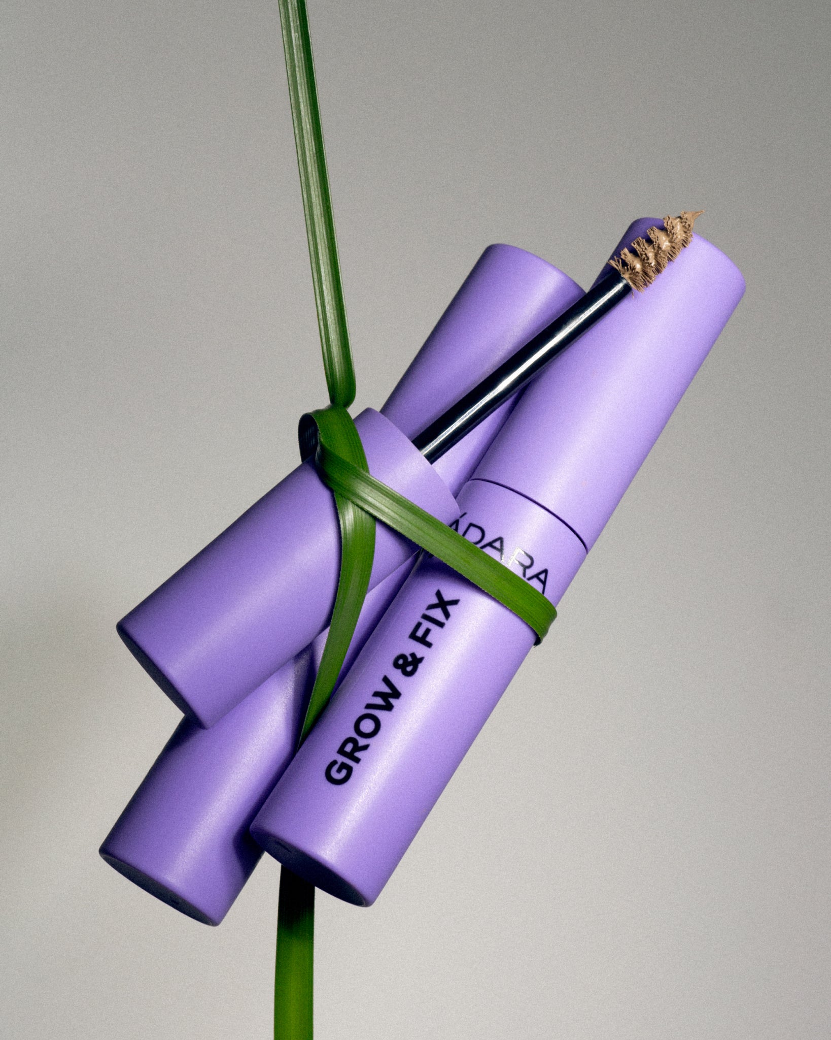 MÁDARA Organic Skincare tinted brow serum A6702 serum product photo on plain background.