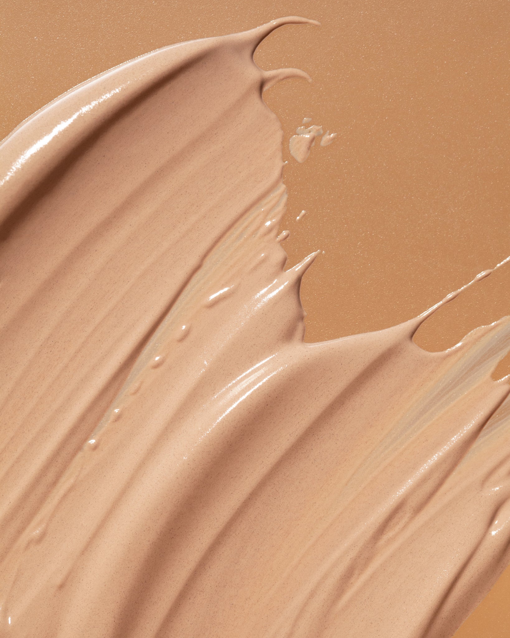 Texture close-up of MÁDARA Organic Skincare tinted spf50 A3416 �swatch demonstrates consistency and finish.
