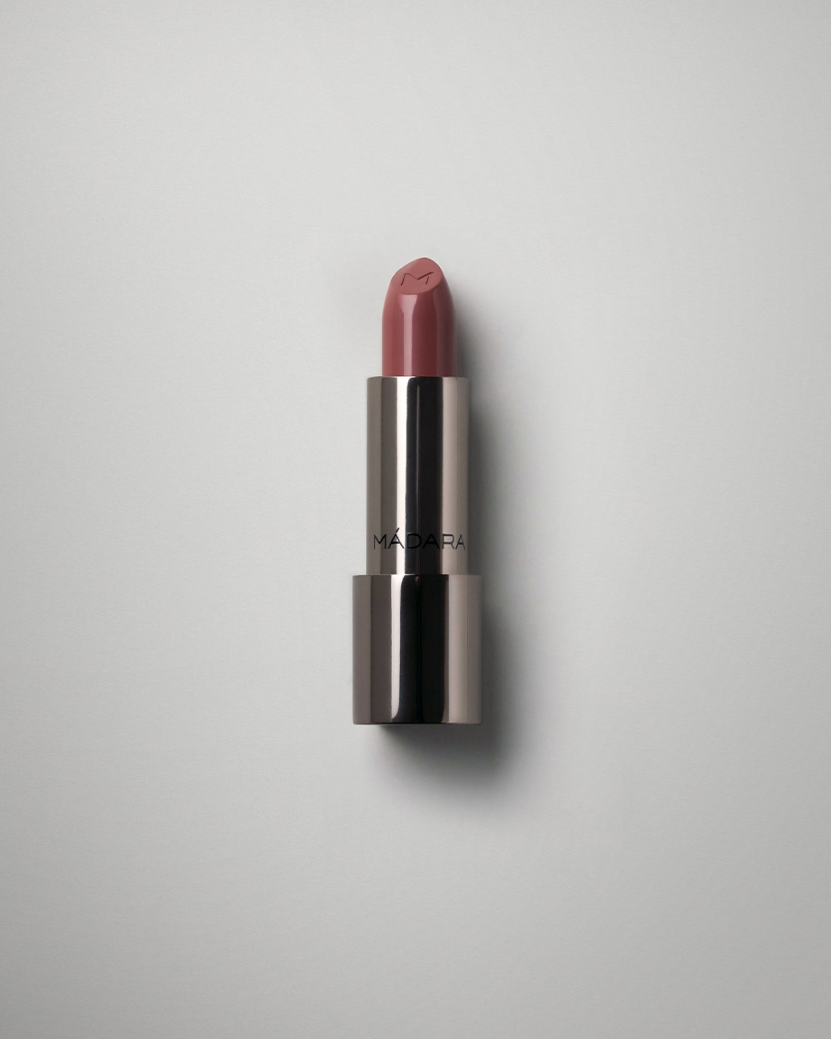 MÁDARA Organic Skincare dazzle nights lipstick charisma A6503 product photo on plain background.