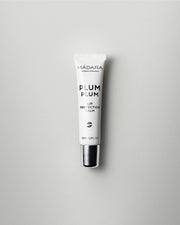MÁDARA Organic Skincare plum plum lip balm A2291 balm product photo on plain background.