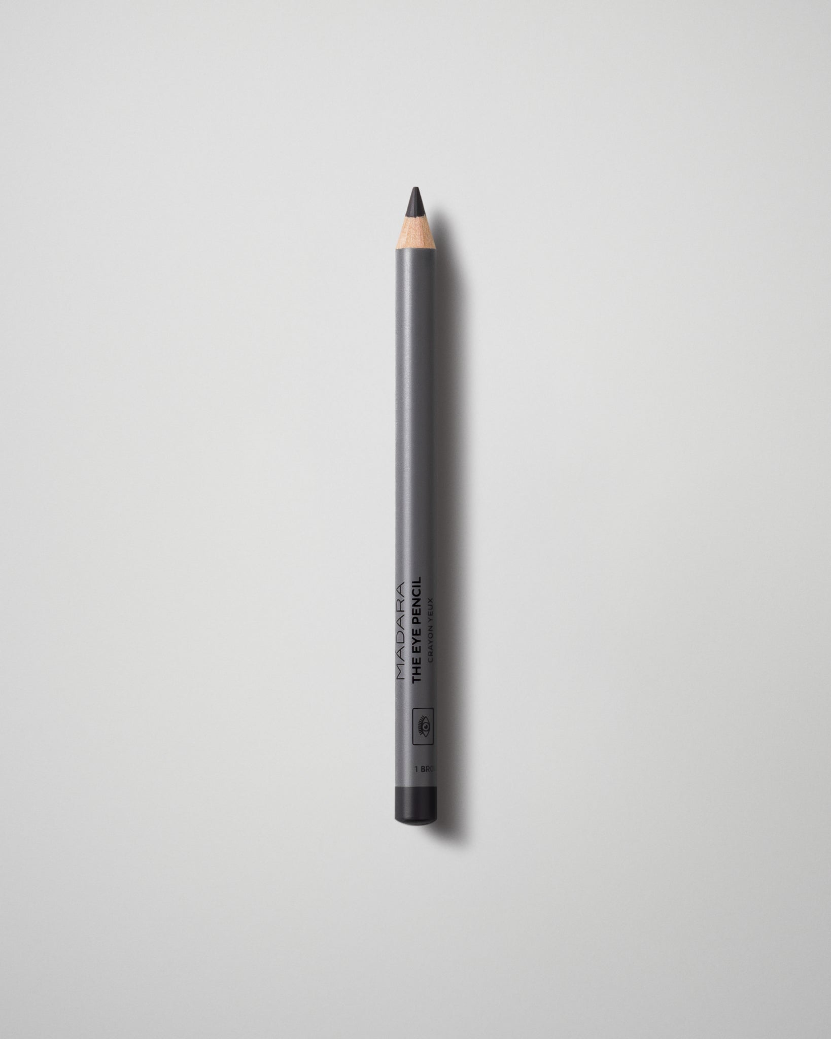 MÁDARA Organic Skincare the eye pencil black A6881 eye contour care product photo on plain background.