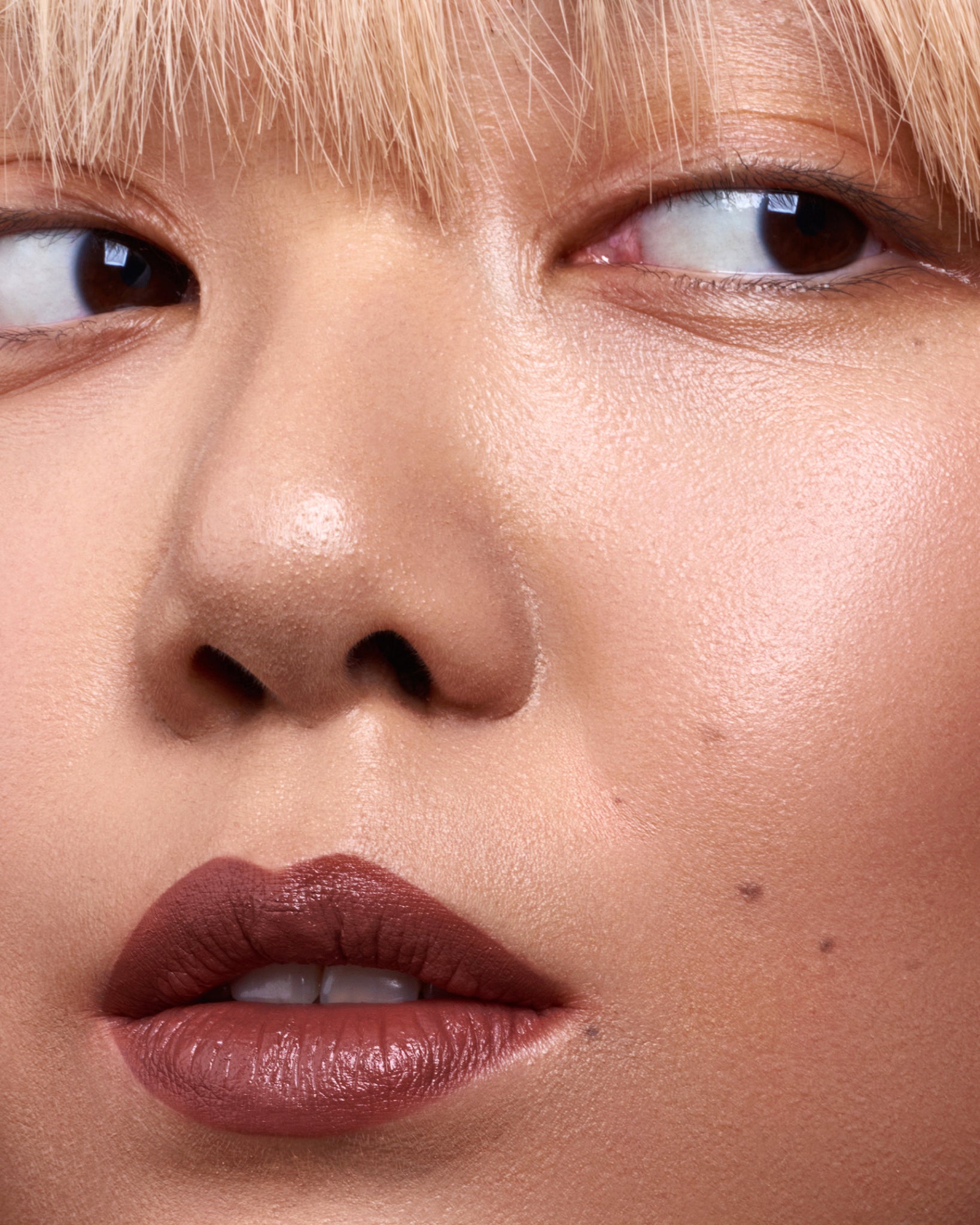 MÁDARA Organic Skincare dark nude lipstick A6305 product photo on plain background.