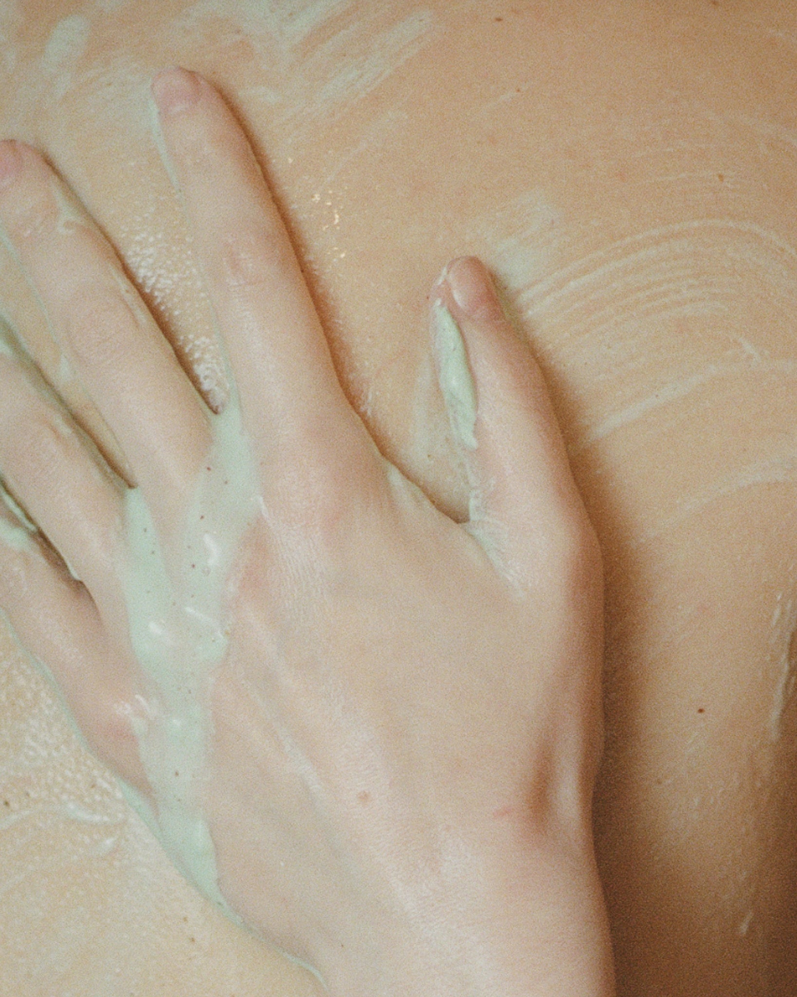 Texture close-up of MÁDARA Organic Skincare mineral body peel SM1252 20 �swatch demonstrates consistency and finish.