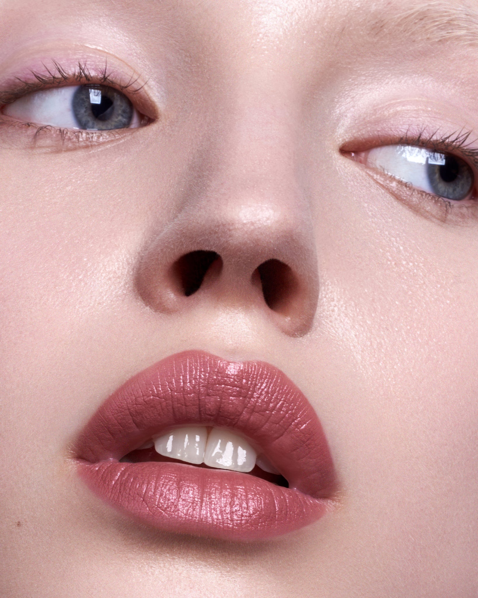 Model wearing MÁDARA Organic Skincare velvet wear cool nude on A6301 on skin; close-up portrait shows natural application results.