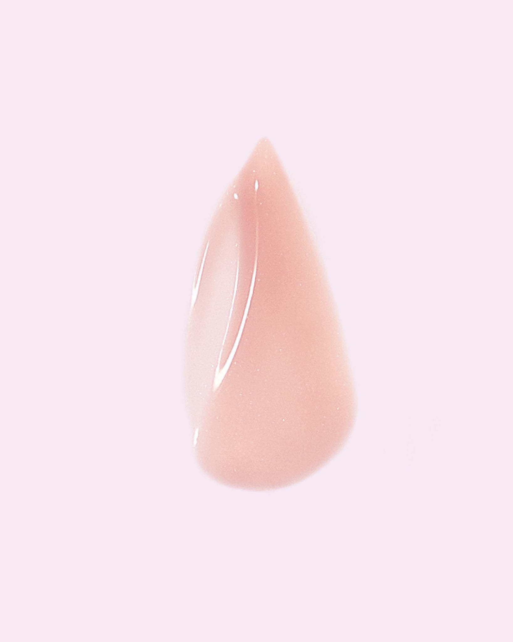 Model wearing MÁDARA Organic Skincare moisturising face serum SM3021 15 serum on skin; close-up portrait shows natural application results.